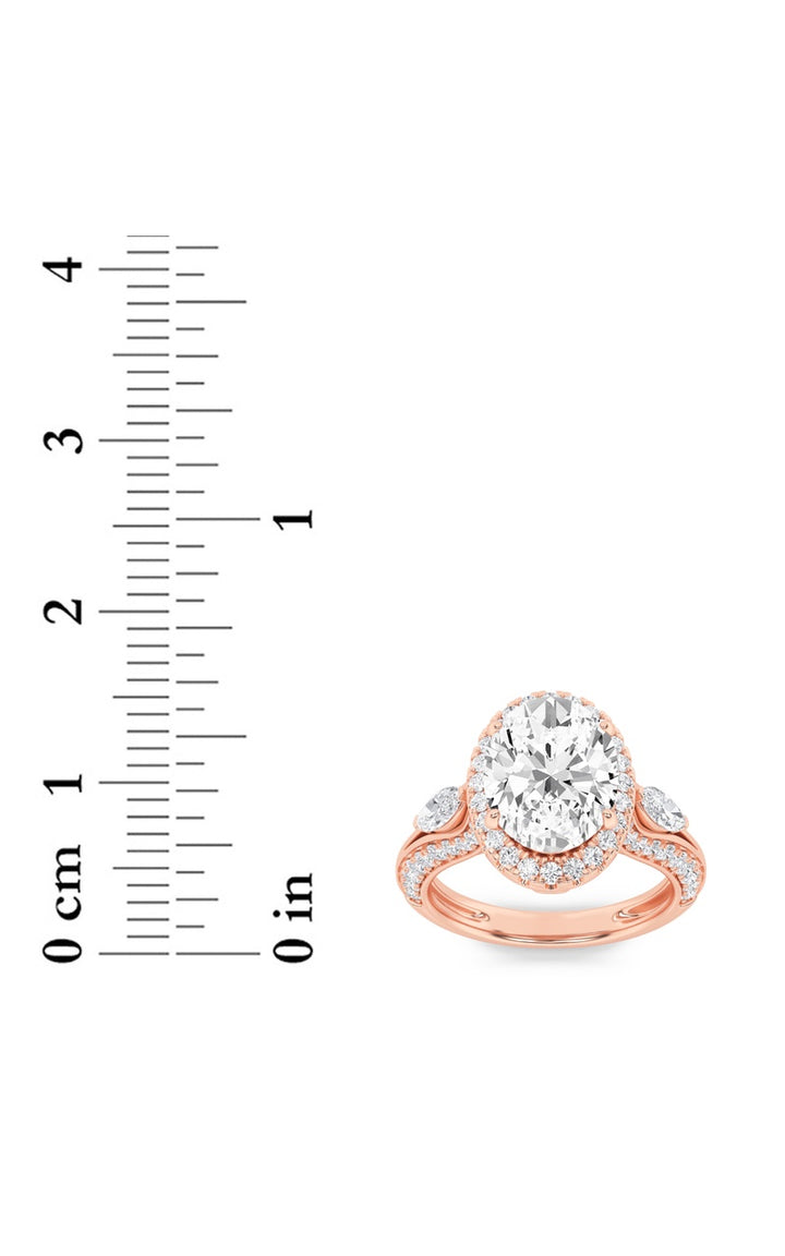 3Cttw Oval Shaped Lab Grown Diamond (F/VS) Three Stone Halo Enagement Ring in 14K Gold