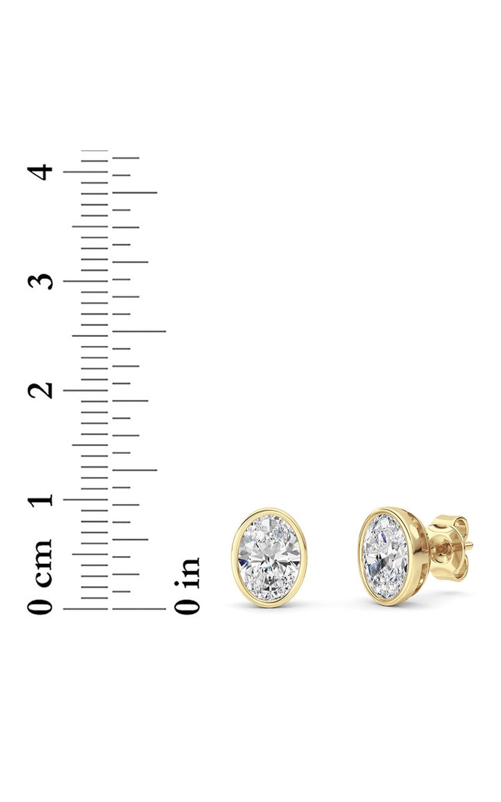 2CTW Oval Shaped Lab Grown Diamond (F/VS) Bezel Set Stud Earrings in 14K Gold