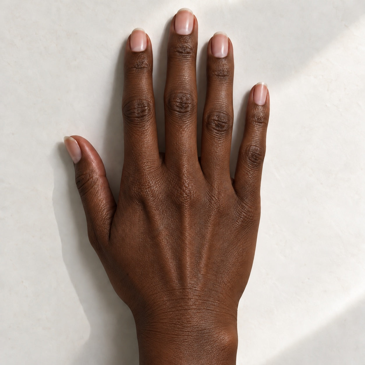 Deep skin tone hand, size preview